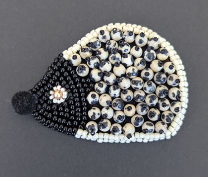 Image of Dalmatian Baby Hedgehog Brooch | Glass Beads + Pom Pom