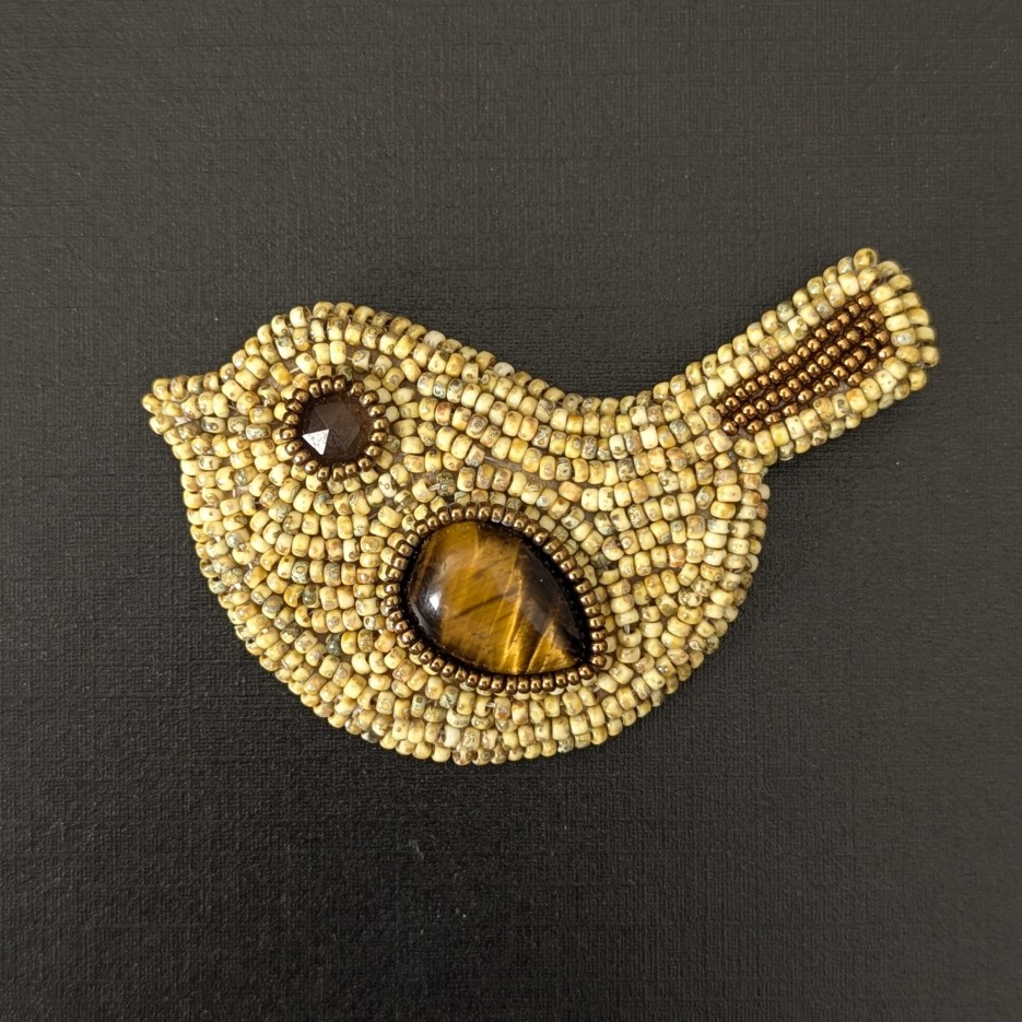 Image of Ivory Picasso Bird Brooch | Tigereye, Quartz + Glass Beads